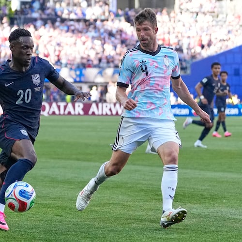 United States' Folarin Balogun (20) and Belgium's Brandon Mechele (4) battle for the ball during the World Cup round of 16 soccer match between the United States and Belgium in Seattle, Monday, July 6, 2026. (AP Photo/Lindsey Wasson)