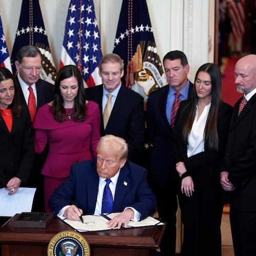 President Donald Trump signs the Laken Riley Act into law at the White House in Washington, D.C., Jan. 29, 2025. The law, named after a Georgia student murdered by an undocumented immigrant, was the first bill of the second Trump administration. (Yuri Gripas/Abaca Press/TNS)