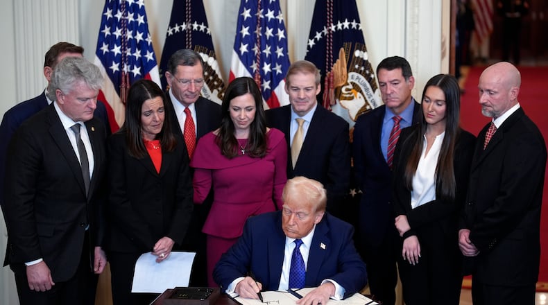 President Donald Trump signs the Laken Riley Act on Wednesday, Jan. 29, 2025, in the East Room at the White House in Washington, D.C. (Yuri Gripas/Abaca Press/TNS)