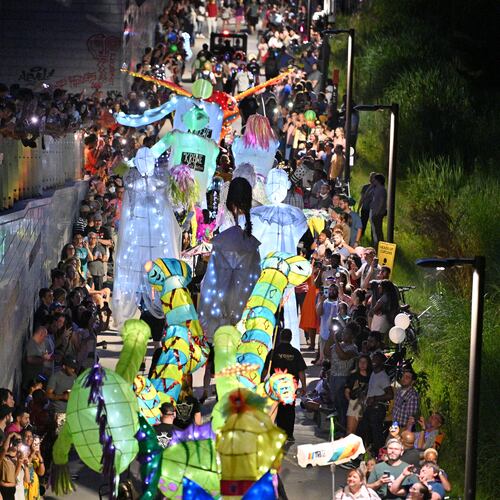May 21, 2022 Atlanta - Hundreds of parade participants float on the Atlanta Beltline Westside Trail during the 12th Atlanta Beltline Lantern Parade on Saturday, May 21, 2022. (Hyosub Shin / Hyosub.Shin@ajc.com)