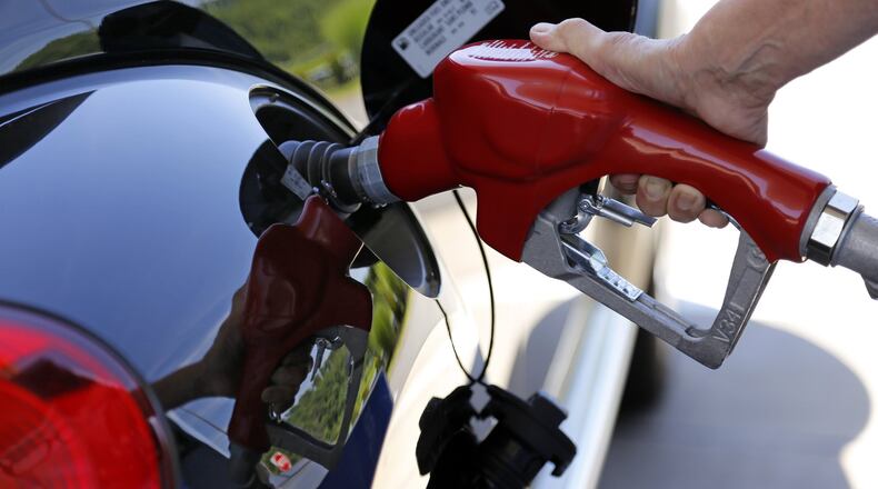 Gassing up is a little more costly, thanks to Hurricane Harvey and the flooding it caused in Texas. (AJC file photo)