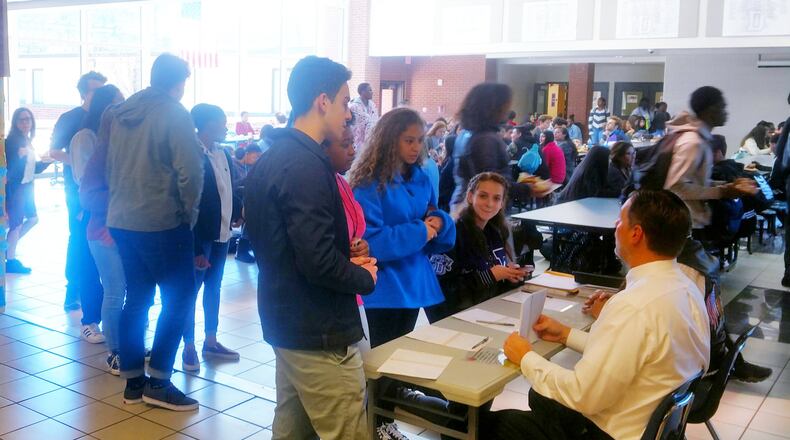 Part of the ongoing education about American government are voter registration drives at Gwinnett County Public Schools. Picture here are students at Duluth High School. PHOTO COURTESY OF GWINNETT COUNTY PUBLIC SCHOOLS