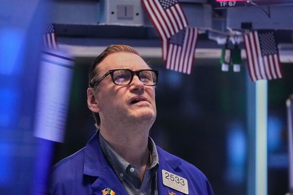 Specialist Patrick King works on the floor of the New York Stock Exchange, Friday, May 2, 2025. (AP Photo/Richard Drew)