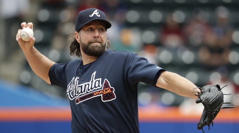 Braves pitcher R.A. Dickey delivers a pitch against the New York Mets on Thursday, April 27, 2017, in New York. (AP Photo/Frank Franklin II)
