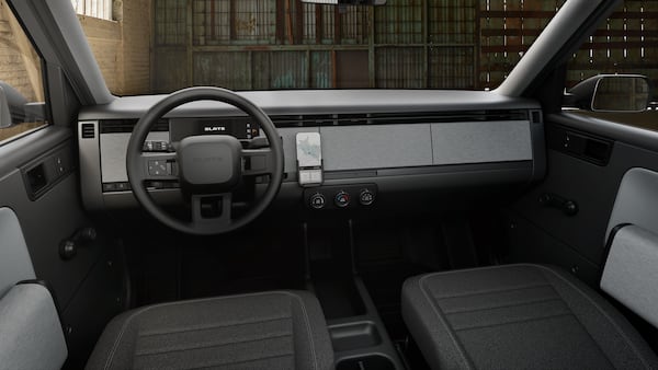 The Slate Truck cabin is minimalistic and neat but sparse. If you want a touchscreen, the Slate has a USB-C jack and a place to mount a tablet. It also features cranked windows as standard equipment. (Courtesy of Slate)