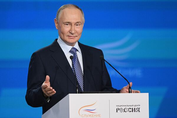 Russian President Vladimir Putin gestures while speaking during a ceremony for the Sluzhenie All-Russian Municipal Service Awards at the Russia National Center in Moscow, Russia, Monday, April 21, 2025. (Ramil Sitdikov, Sputnik, Kremlin Pool Photo via AP)