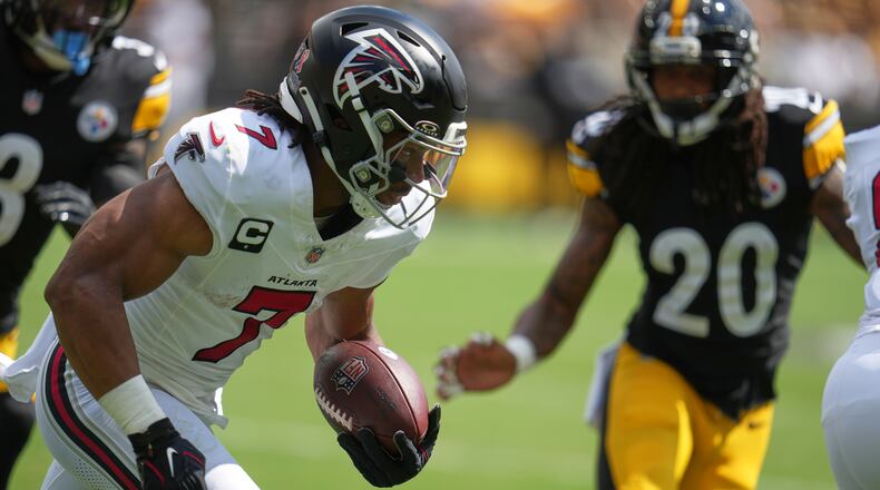 Falcons running back Bijan Robinson runs the ball during an NFL football game against the Pittsburgh Steelers, Sunday, Sept. 13, 2026, in Pittsburgh. (Gene J. Puskar/AP)