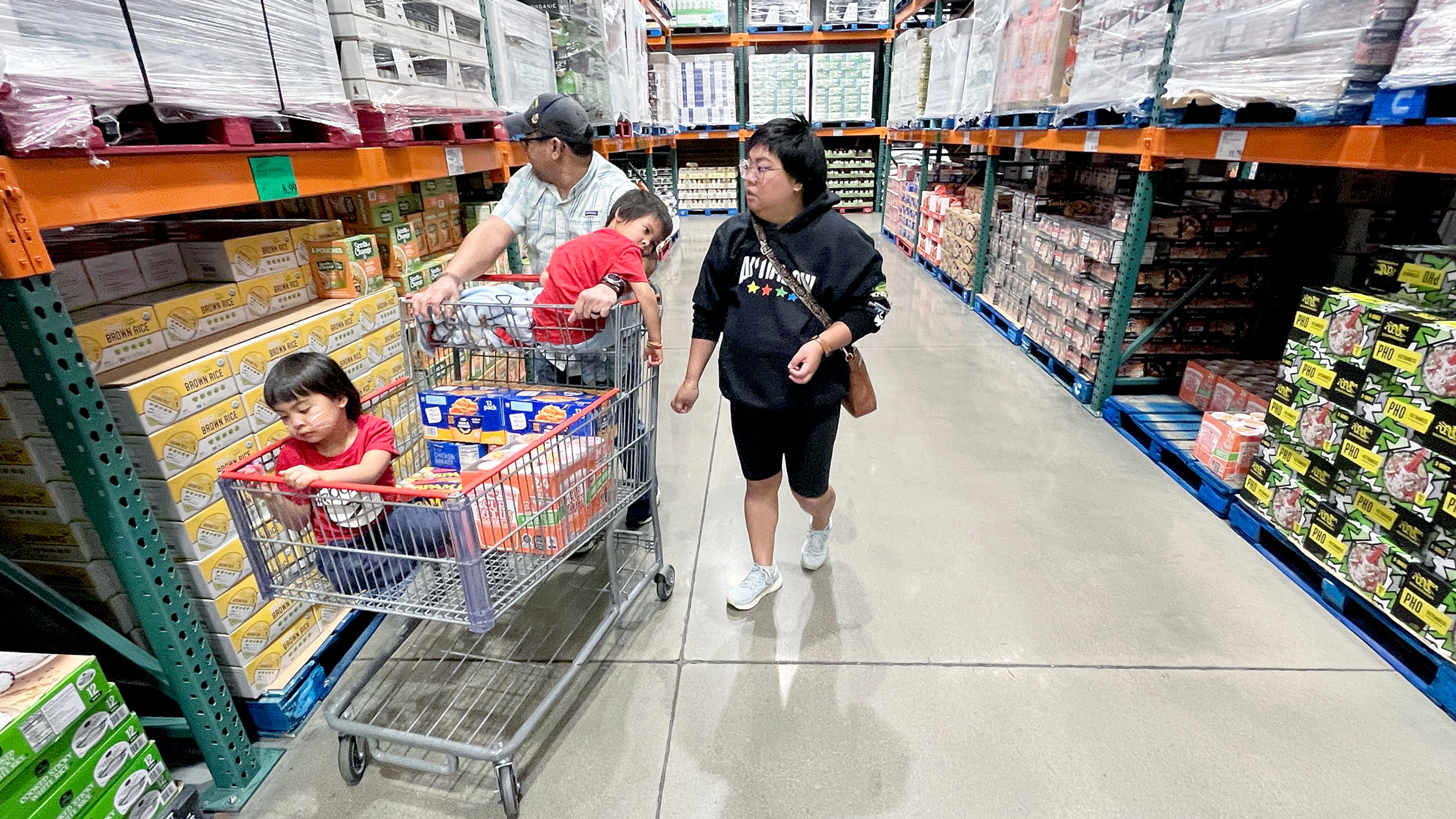 KC Neufeld, right, shops with her family in Englewood, Colo., Wednesday, Oct. 29, 2025.