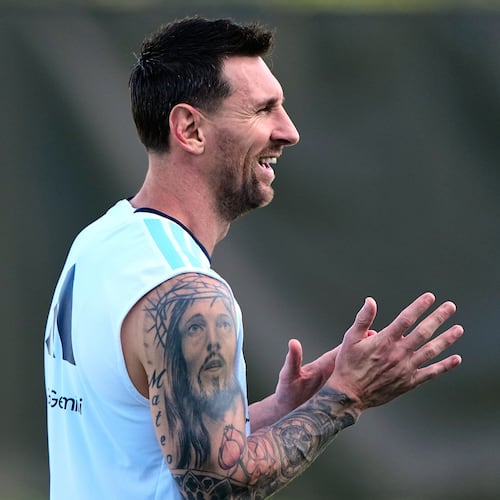 Argentina's Lionel Messi watches training for the World Cup soccer tournament Wednesday, June 24, 2026, in Kansas City, Kan. (AP Photo/Charlie Riedel)