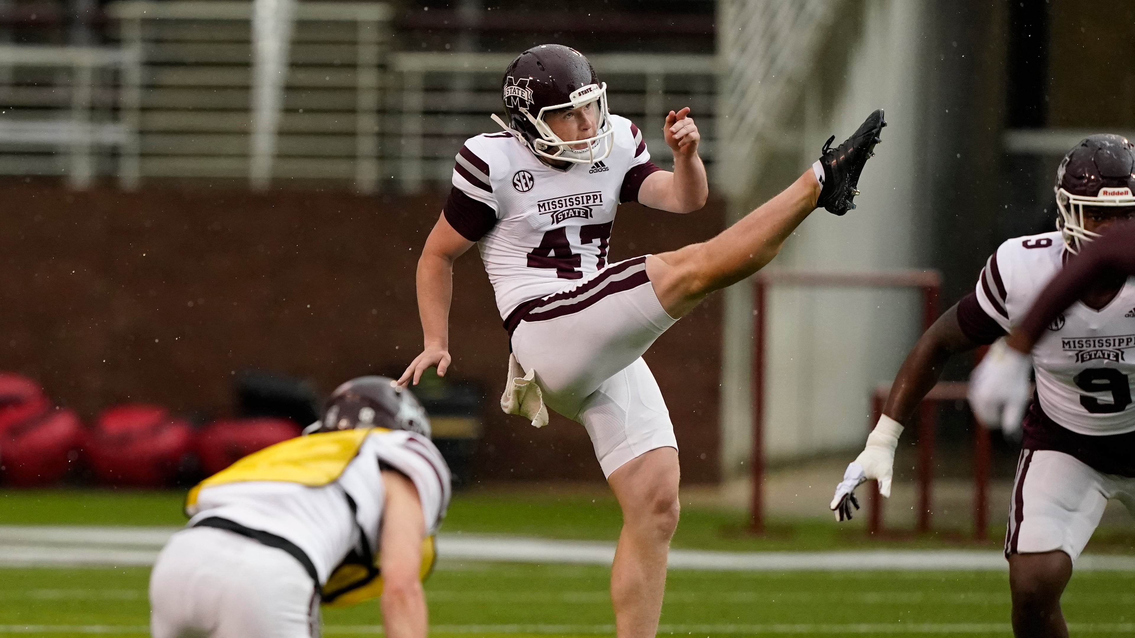 After graduating from Holy Innocents' in 2021, punter Marshall Nichols (center) committed to Mississippi State, but he never played for the Bulldogs outside of the spring scrimmage (pictured). Nichols transferred to UNLV, where he played from 2022-24 before moving on to Georgia Tech for his senior season. (Rogelio V. Solis/AP 2022)