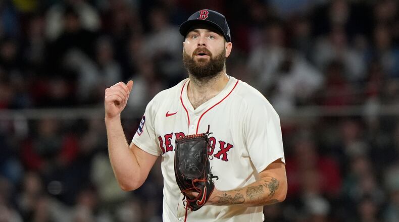FILE - Boston Red Sox pitcher Lucas Giolito reacts after striking out Athletics Lawrence Butler with the bases loaded in the third inning in of a baseball game against the Athletics, Wednesday, Sept. 17, 2025, in Boston. (AP Photo/Robert F. Bukaty, File)