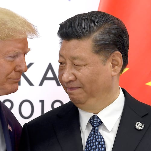 FILE - President Donald Trump, left, meets with Chinese President Xi Jinping during a meeting on the sidelines of the G-20 summit in Osaka, Japan, June 29, 2019. (AP Photo/Susan Walsh, File)