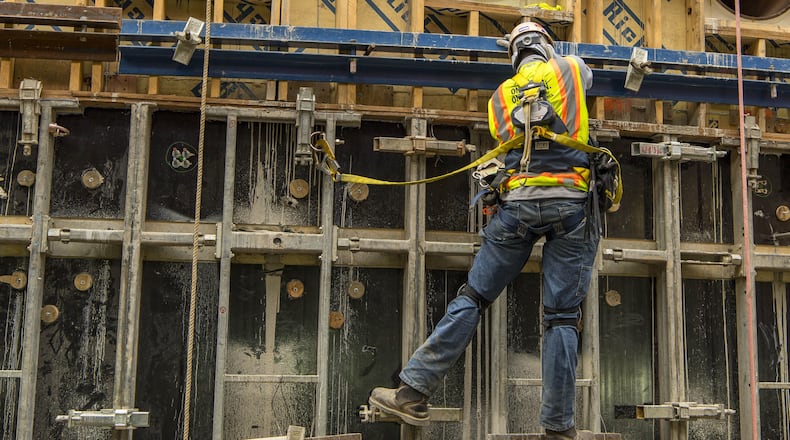 A construction worker helps build one of the new Plant Vogtle nuclear units near Augusta. Georgia Power expects to take over formal management of the troubled project in late July, replacing a bankrupt key contractor. Photo: Georgia Power
