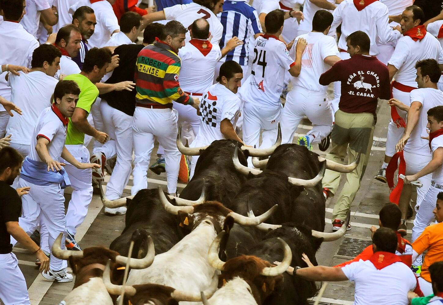 The running of the bulls at the San Fermin fiestas