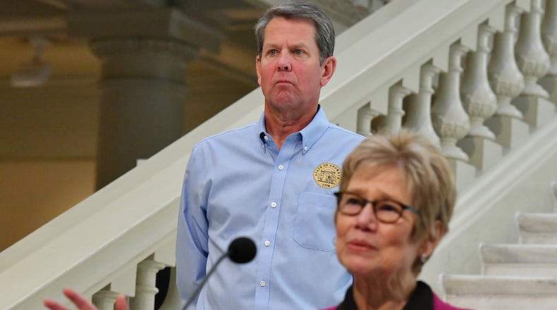 May 12, 2020 Atlanta - Dr. Kathleen Toomey, commissioner of Georgia Department of Public Health, speaks as Governor Brian Kemp looks during a press briefing to update on COVID-19 at the Georgia State Capitol on Tuesday, May 12, 2020. (Hyosub Shin / Hyosub.Shin@ajc.com)