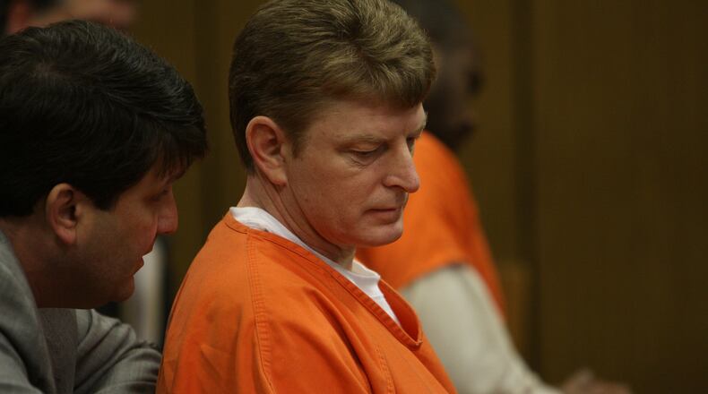 Dennis Allaben, right, with his lawyer Steven Frey at a probable cause hearing in 2010.