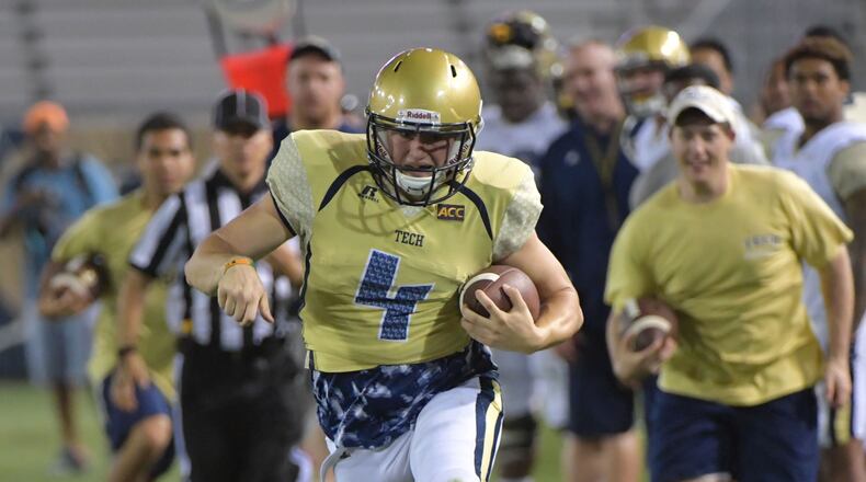 April 21, 2017 Atlanta - Georgia Tech Gold Team B-back Brady Swilling (4) runs for a touchdown during 2017 Georgia Tech Football Spring Game at Bobby Dodd Stadium on Friday, April 21, 2017. HYOSUB SHIN / HSHIN@AJC.COM