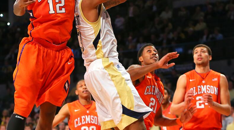 Clemson guard Rod Hall blocks a shot by Georgia Tech guard Marcus Georges-Hunt during the first half of their NCAA basketball game on Thursday.