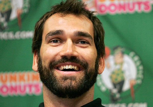 FILE - Boston Celtics center Scot Pollard smiles while facing reporters during a news conference held to introduce the newly signed player at the team's headquarters, in Boston, Thursday, Aug. 9, 2007. (AP Photo/Steven Senne, File)