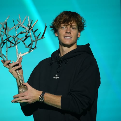 Italy's Jannik Sinner holds the trophy after winning the final match of the Paris Masters tennis tournament against Canada's Felix Auger-Aliassime in Paris, Sunday, Nov. 2, 2025. (AP Photo/Christophe Ena)