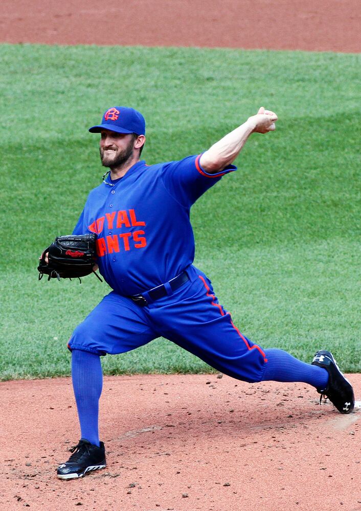 Bright blue and bright orange collide on Mets uniforms