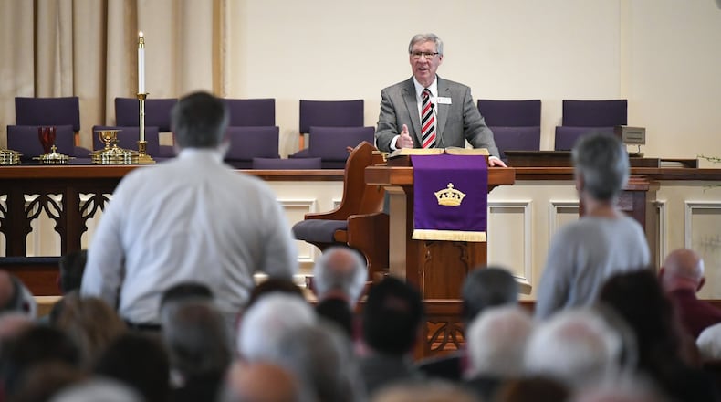 District Superintendent David Naglee conducts a question-and-answer session during a district gathering at Kennesaw United Methodist Church on Sunday. The UMC voted to maintain and strengthen its stance against gay marriage and gay clergy during a special session of the General Conference last month. This meeting provided a chance for members to hear and ask questions, take Communion, and worship together. CONTRIBUTED BY JOHN AMIS