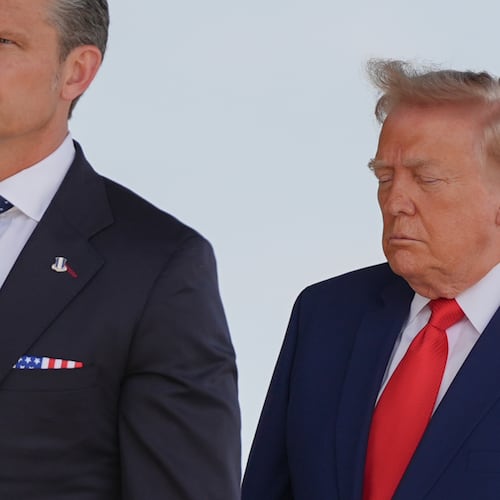 Defense Secretary Pete Hegseth and President Donald Trump attend the dignified transfer of four U.S. service members recently killed in the Middle East, Wednesday, July 22, 2026, at Dover Air Force Base, Del. (AP Photo/Julia Demaree Nikhinson)