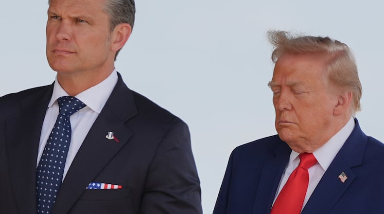 Defense Secretary Pete Hegseth and President Donald Trump attend the dignified transfer of four U.S. service members recently killed in the Middle East, Wednesday, July 22, 2026, at Dover Air Force Base, Del. (AP Photo/Julia Demaree Nikhinson)