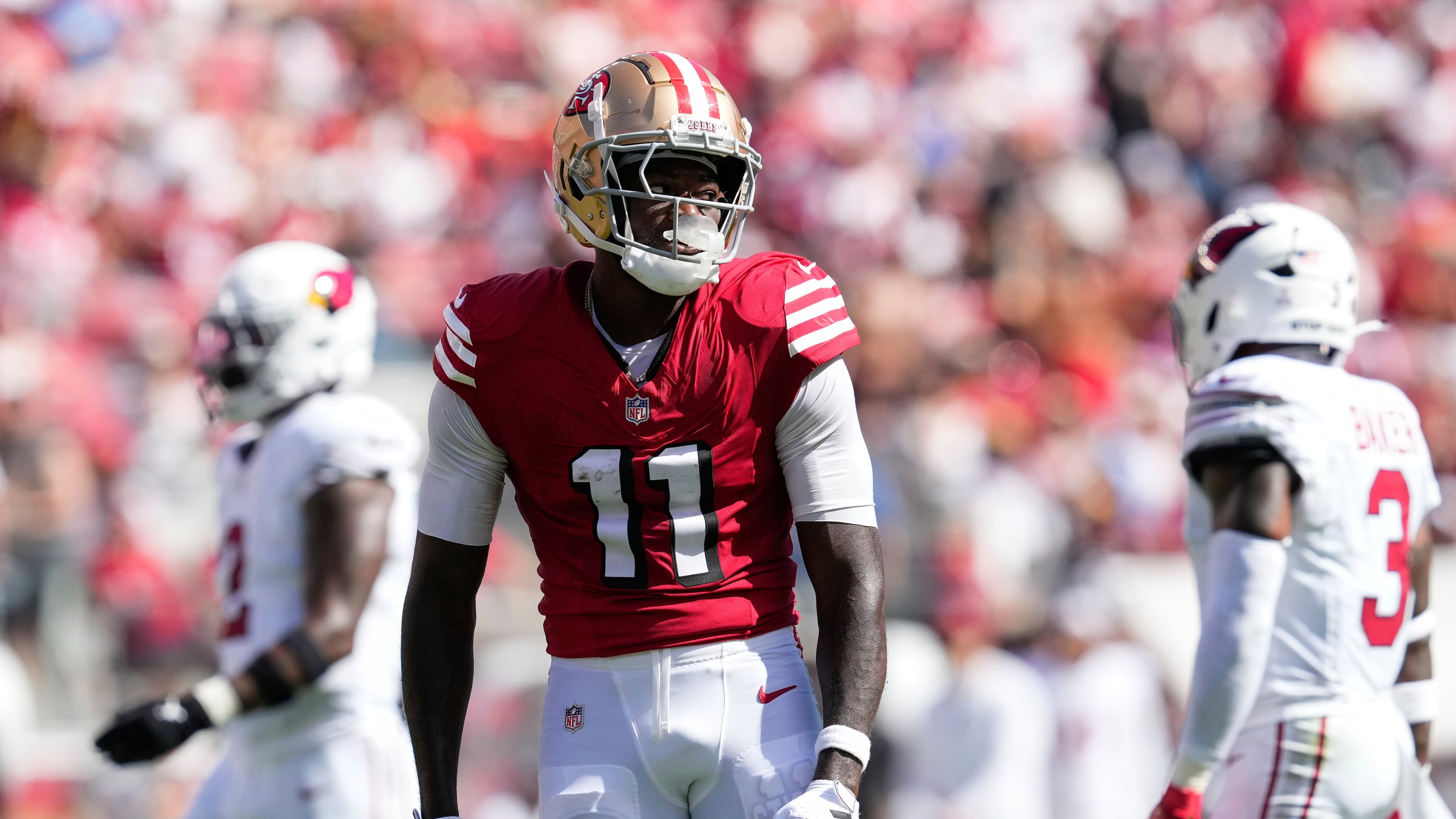 FILE - San Francisco 49ers wide receiver Brandon Aiyuk (11) reacts during the first half of an NFL football game against the Arizona Cardinals, Oct. 6, 2024, in Santa Clara, Calif. (AP Photo/Godofredo A. Vásquez, File)