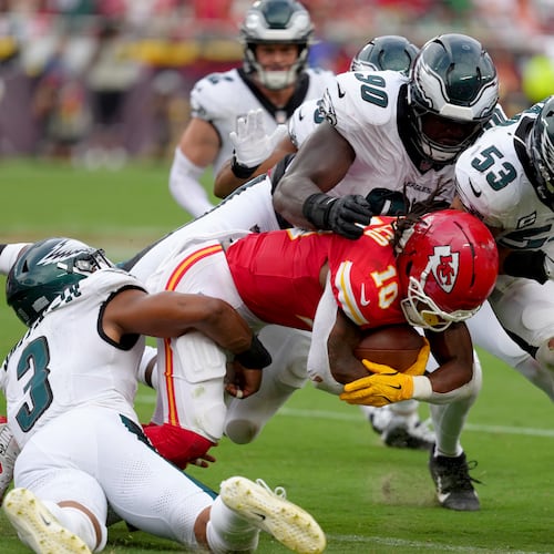 Philadelphia Eagles' Nolan Smith (left) and Jordan Davis (second from right) were among the 12 former Georgia players that reunited when Philadelphia took on the Green Bay Packers on Monday Night Football. (Ed Zurga/AP)