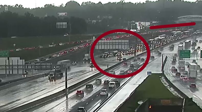Heavy rain flooded several lanes of Interstate 75 near Windy Hill Rd. on Tuesday, July 21, 2020. AJC WSB Traffic via Twitter