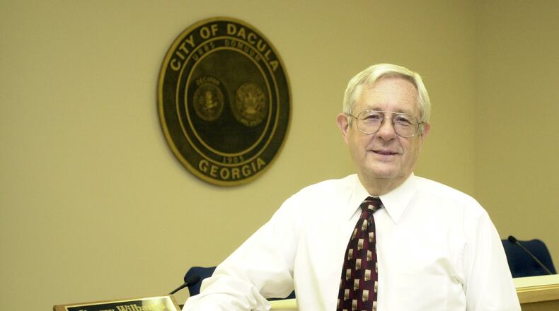 020801 DACULA -- Jimmy Wilbanks, who was mayor of Dacula in the early 1970s, has returned to the job. Shown in the council chambers on Thursday, August 1, 2002. (LAURA NOEL/STAFF)