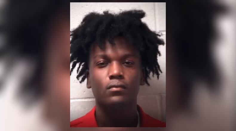Quinton Renard Smith, 21, turned himself in Wednesday to face charges tied to a Dec. 20 shooting in Henry County that left a 16-year-old girl dead.