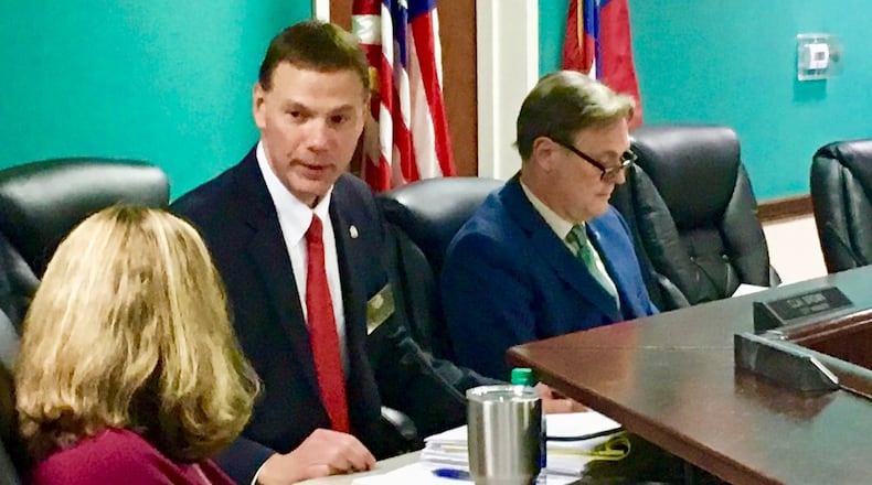 Clai Brown, left and Mayor Jonathan Elmore in friendlier times when Brown was Avondale Estates’ city manager. After resigning in Feb. 2018, Brown is now returning to run for mayor against Elmore. Bill Banks file photo for the AJC