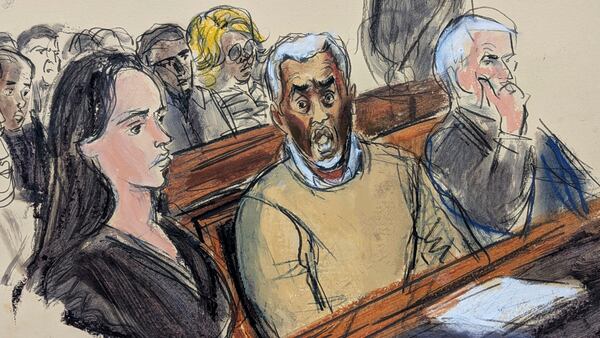 In this courtroom sketch, flanked by defense attorneys Teny Geragos, left, and Brian Steel, right, Sean "Diddy" Combs, center, reacts after he was denied bail on prostitution-related offenses, Wednesday, July 2, 2025, in Manhattan federal court in New York. (Elizabeth Williams via AP)