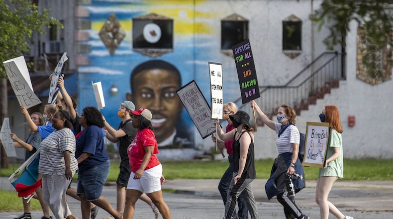 Ahmaud Arbery supporters participate in an impromptu peaceful march in Brunswick, Thursday, June 4, 2020. A judge found probable cause against 3 suspects in the Ahmaud Abrery case. The case will now be bound over to the Georgia Superior Court. (ALYSSA POINTER / ALYSSA.POINTER@AJC.COM)