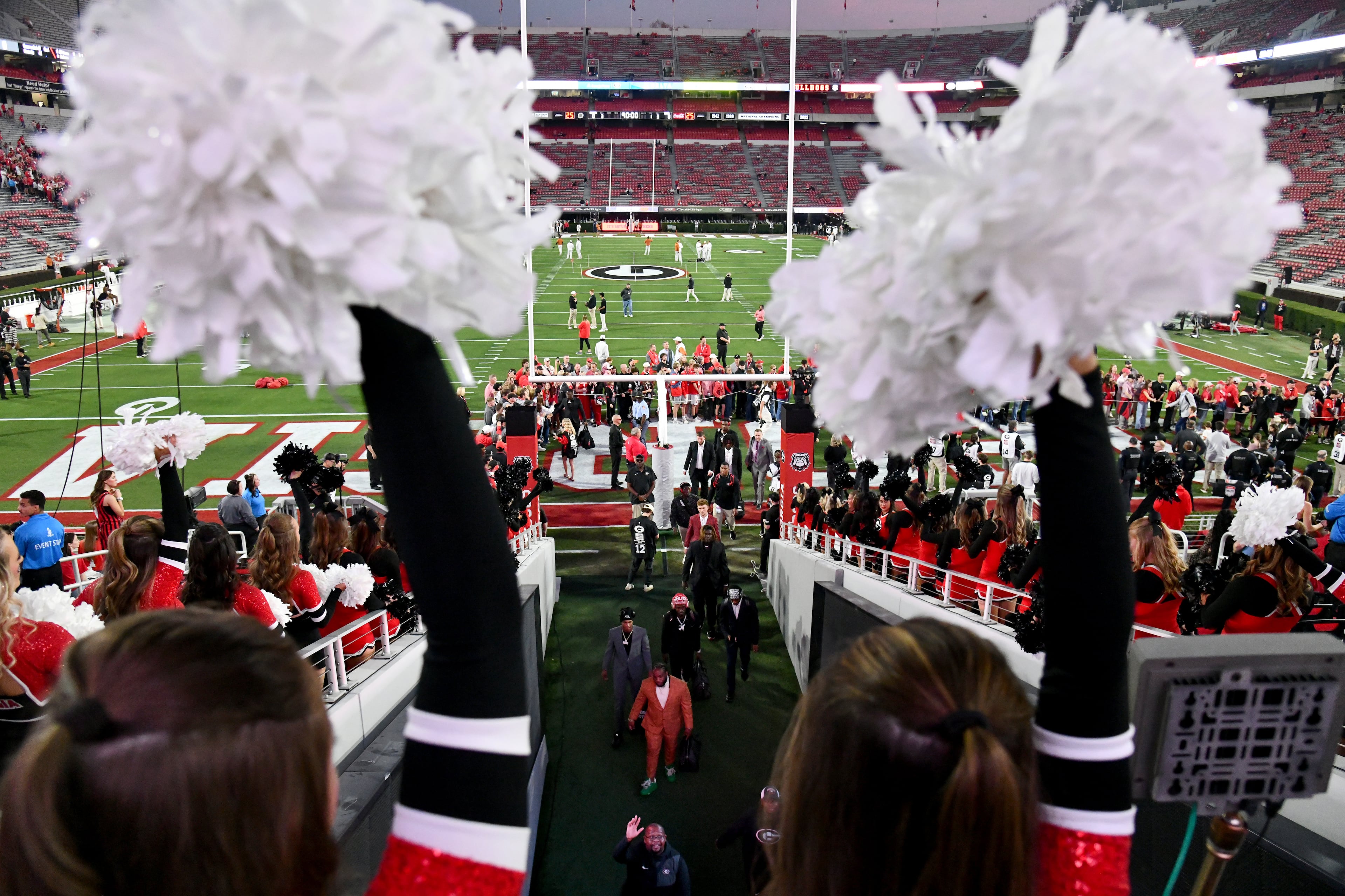 Georgia players and staff arrive during Dawgs Walk before an NCAA football game between Georgia and Texas at Sanford Stadium, Saturday, November 15, 2025, in Athens. (Hyosub Shin / AJC)