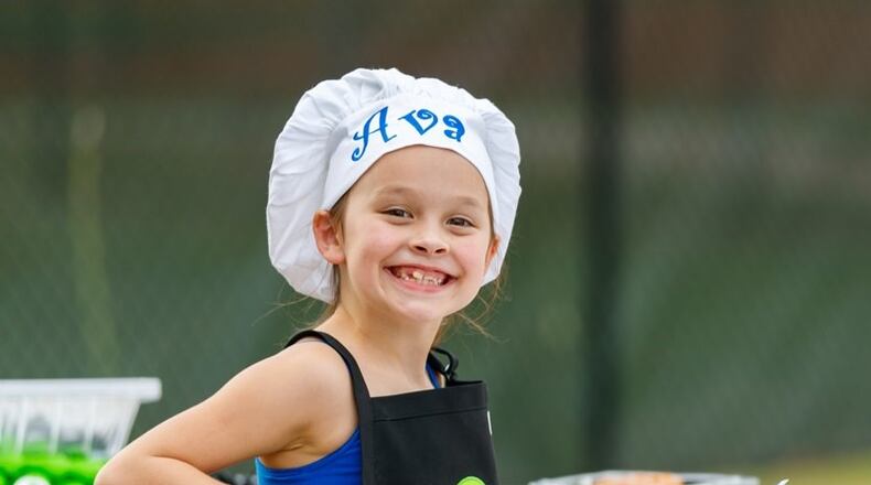 A new Kid's 'Que Cook-off will be a part of the 20th Pigs & Peaches BBQ Festival in Kennesaw on Aug. 20 and 21. An Aug. 7 workshop is required before entry for ages 7 to 15, costing $50 for the workshop and the Cook-off. (Courtesy of Kennesaw)