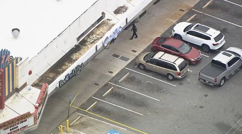 Atlanta police said a woman was injured in a shooting outside the Plaza Theatre on Monday afternoon.