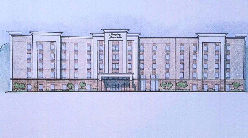 Snellville approved a 64,400-square-foot Hampton Inn & Suites at Pharrs Road and Scenic Highway. The hotel is going up on Pharrs Road behind a Cracker Barrel restaurant.