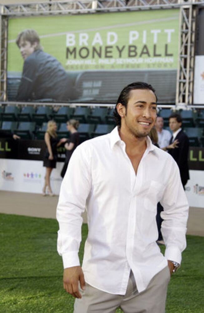Cast, baseball figures attend the premiere of 'Moneyball'