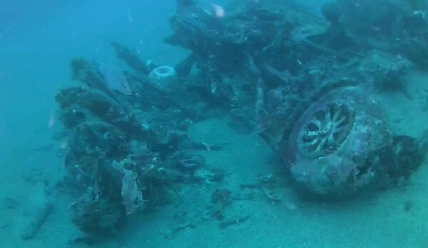 This October 2017 photo shows wreckage of the B-24 Liberator bomber, Heaven Can Wait, lying on the seafloor where it went down during World War II in Hansa Bay, Papua, New Guinea. (Courtesy of Project Recover via AP)