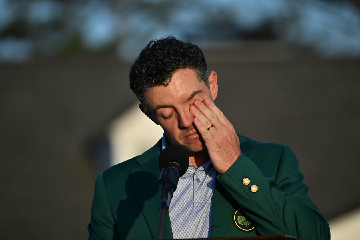 Masters champion Rory McIlroy wipes away a tear at the Green Jacket Ceremony at Augusta National Golf Club on April 12, 2026 in Augusta, Ga. (Hyosub Shin/AJC)
