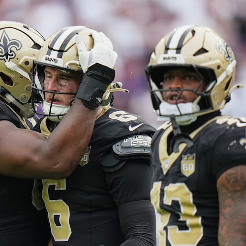 New Orleans Saints quarterback Tyler Shough (6) reacts after scoring the winning touchdown on fourth down in the second half of an NFL football game against the Baltimore Ravens in Baltimore, Sunday, Sept. 20, 2026. (AP Photo/Stephanie Scarbrough)