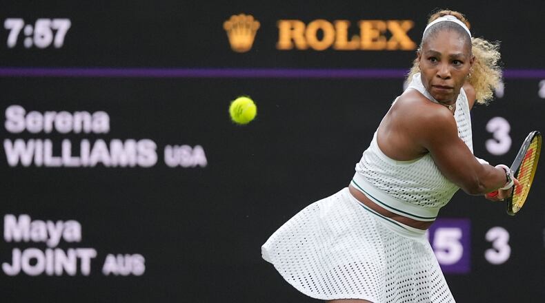 Serena Williams of the United States plays a backhand against Maya Joint of Australia in their first round women's singles match at the Wimbledon Tennis Championships in London, Tuesday, June 30, 2026. (AP Photo/Maja Smiejkowska)