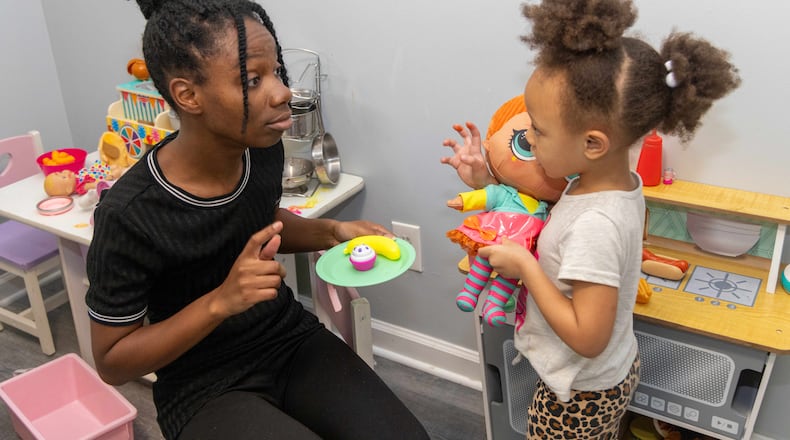 Tannyetta Robinson plays with her 4-year-old daughter Ayla in their Atlanta apartment. The nonprofit Our House, which helps the homeless get back on their feet, helped her get the apartment. PHIL SKINNER FOR THE ATLANTA JOURNAL-CONSTITUTION
