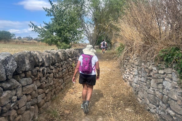 A pilgrim walks along the Ignatian Way heading towards Manresa, Spain, Wednesday, July 9, 2025. (AP Photo/Joseph Wilson)