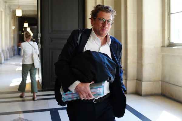 Joseph Hazan, a lawyer for Aomar Aït Khedache, one of the men accused in the 2016 armed robbery of Kim Kardashian, arrives at the palace of justice Monday, April 28, 2025 in Paris. (AP Photo/Aurelien Morissard)