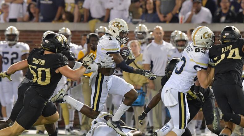 October 21, 2017 Atlanta - Georgia Tech running back Qua Searcy (1) runs with the ball in the first half of an NCAA college football game at Bobby Dodd Stadium on Saturday, October 21, 2017. HYOSUB SHIN / HSHIN@AJC.COM