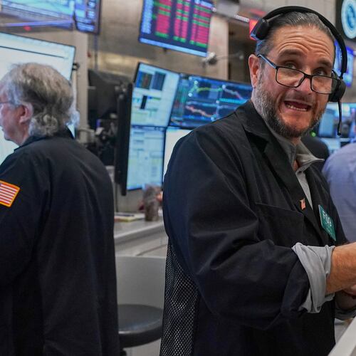 Options trader Chris Dattolo works on the floor of the New York Stock Exchange, Wednesday, May 13, 2026. (AP Photo/Richard Drew)